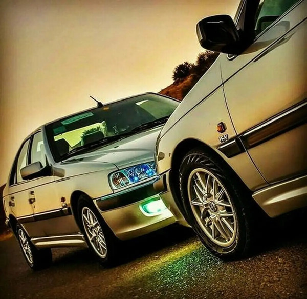 عکس پژو مشکی با رینگ خرچنگی