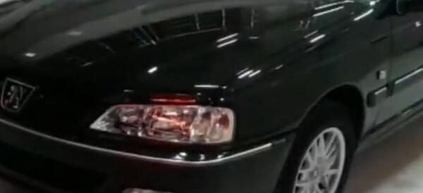عکس پژو مشکی با رینگ خرچنگی
