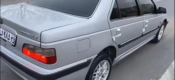 عکس پژو پارس مشکی با رینگ خرچنگی