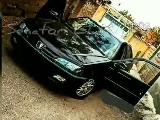 عکس پژو پارس مشکی با رینگ خرچنگی