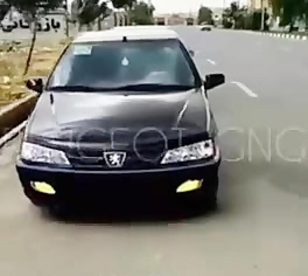 عکس پژو پارس مشکی با رینگ خرچنگی