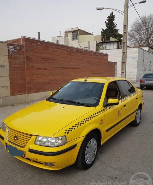 عکس تاکسی پژو زرد