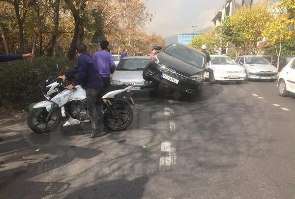 عکس پژو دلفینی تصادفی
