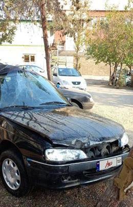 عکس پژو پارس مشکی تصادفی