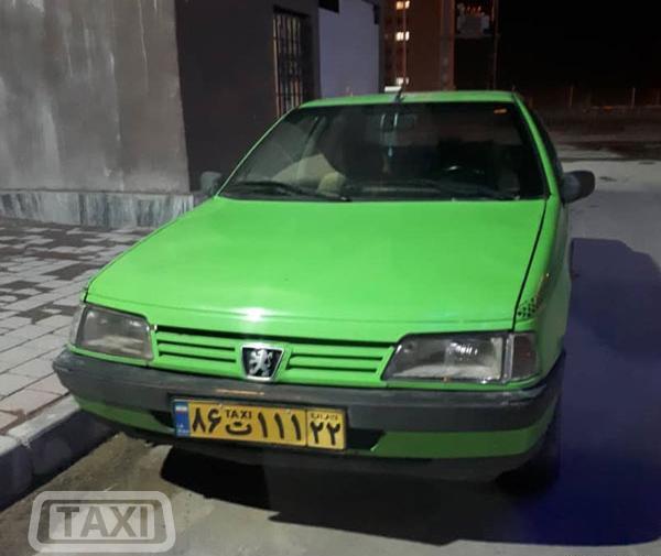 عکس تاکسی پژو سبز