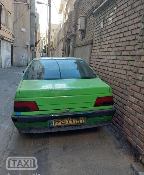 عکس تاکسی پژو سبز