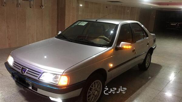 عکس پژو 405 اسپرت نقره ای