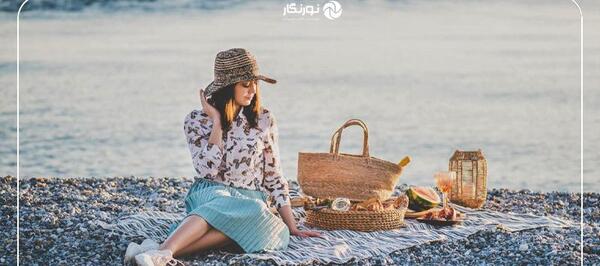 عکس دختر از نیم رخ کنار دریا