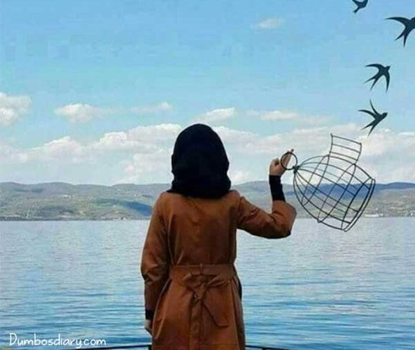 عکس دختر از نیم رخ کنار دریا