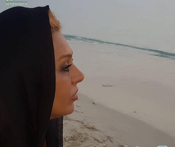 عکس دختر از نیم رخ کنار دریا