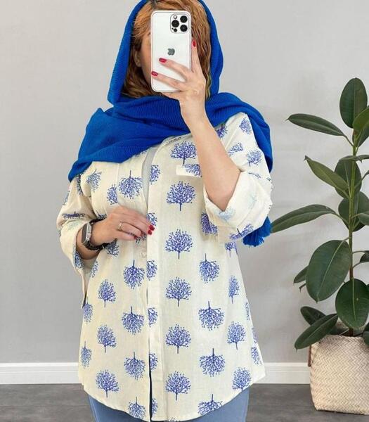 عکس مدل مانتو کلوش با پارچه ابروبادی