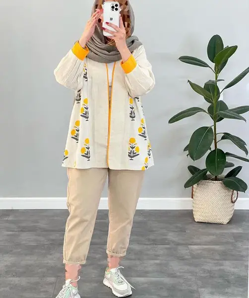 عکس مدل مانتو با پارچه ابروبادی پوم دار