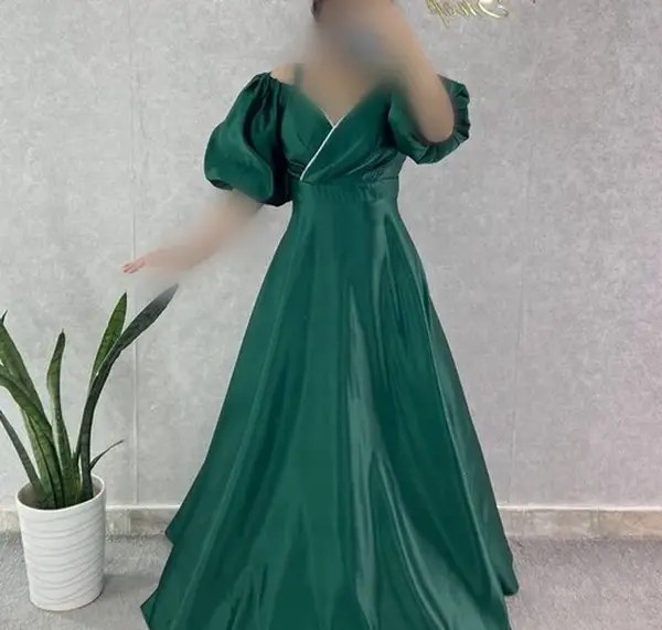 عکس لباس مجلسی زنانه ساتن سبز