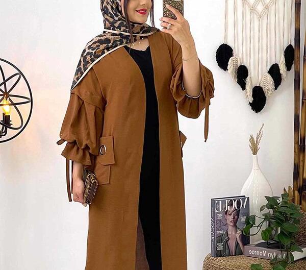عکس مدل مانتو بلند جلو بسته دکمه دار