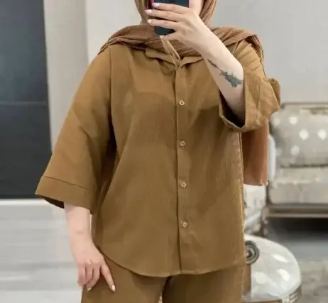 عکس مدل مانتو نخی ساده وشیک دکمه دار
