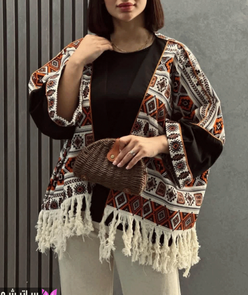 عکس مدل مانتو مشکی با پارچه ریش ریشی