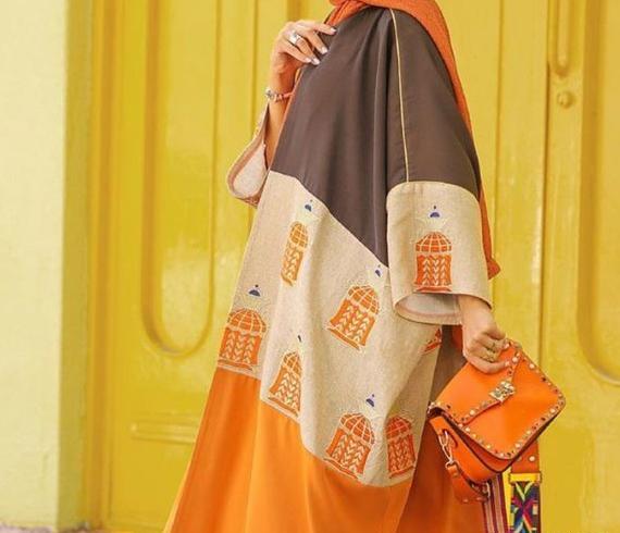 عکس دختر با مانتو نارنجی
