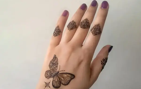 عکس نقاشی پروانه روی دست