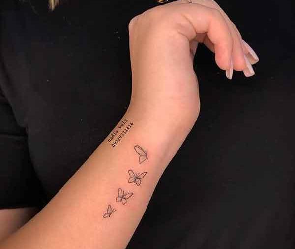 عکس نقاشی پروانه روی دست