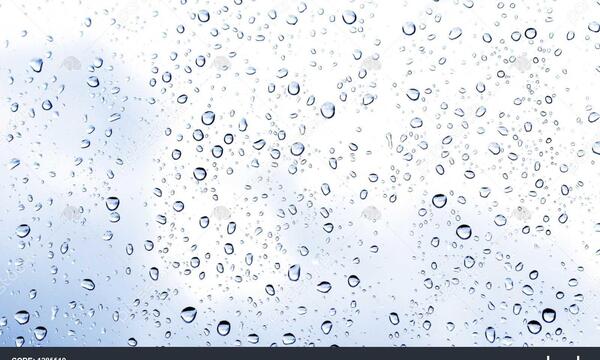 عکس قطره باران روی شیشه