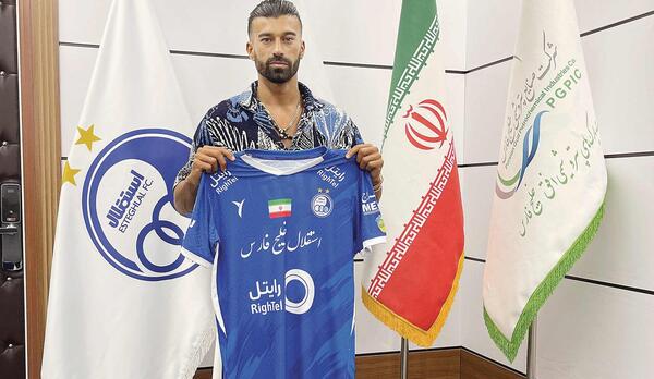 عکس رامین رضاییان با توپ طلا