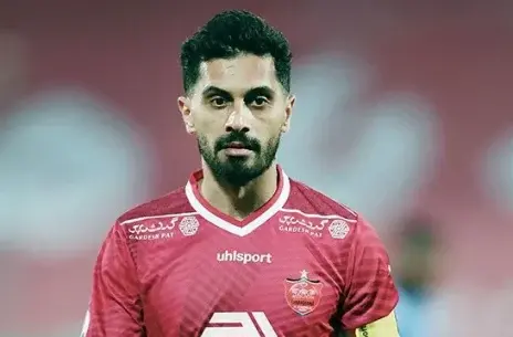 عکس امید عالیشاه با جام