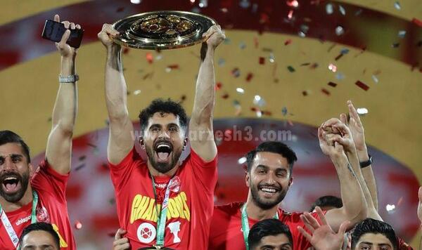 عکس امید عالیشاه با جام