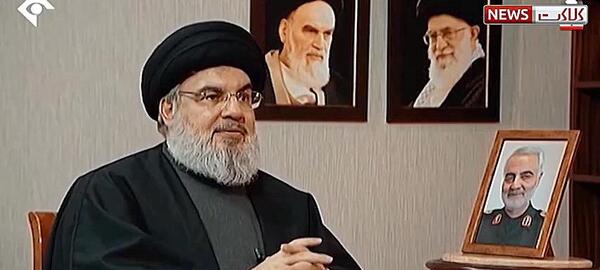 عکس نوشته سید حسن نصرالله و حاج قاسم