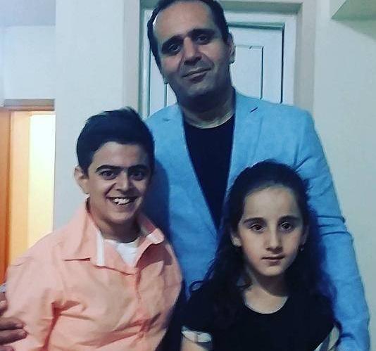 عکس حسین رفیعی و فرزندانش