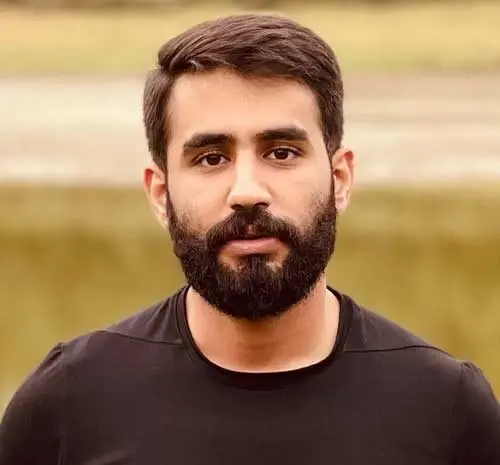عکس حسین طاهری با پدرش