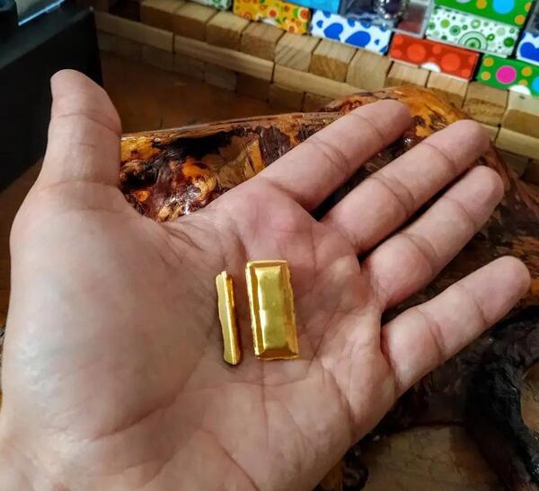 عکس شمش طلا آب شده