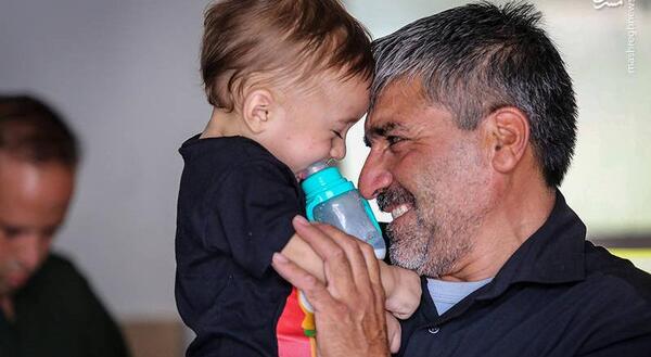 عکس همسر و فرزند شهید حججی