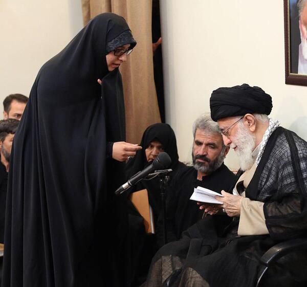 عکس همسر و فرزند شهید حججی