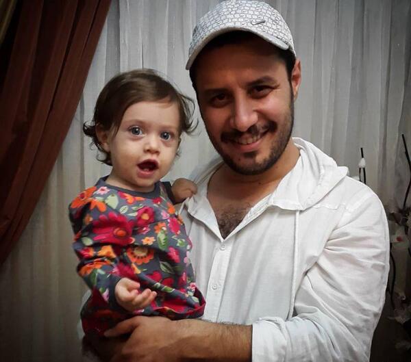 عکس بچه جواد عزتی و همسرش