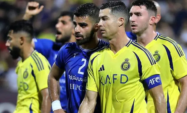 عکس محمدرضا گلزار با روبرتو کارلوس