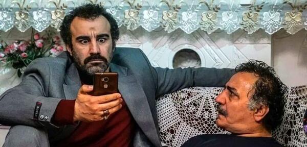 عکس از محسن تنابنده و همسر و فرزندش