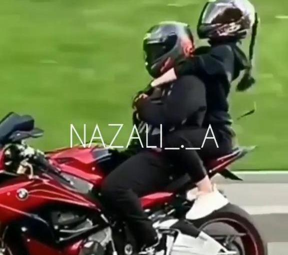 عکس دختر پسر روی موتور