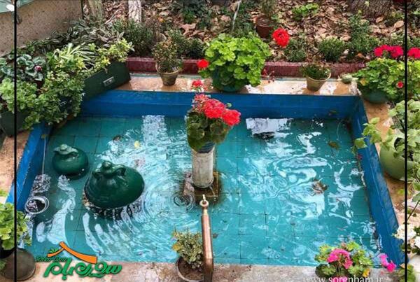 عکس خانه ی قدیمی با حوض