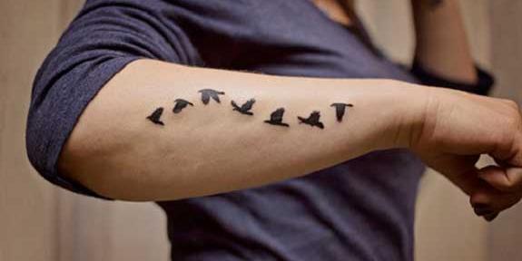 عکس تاتو پرنده روی دست