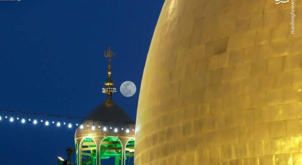عکس خورشید بالای گنبد حضرت علی