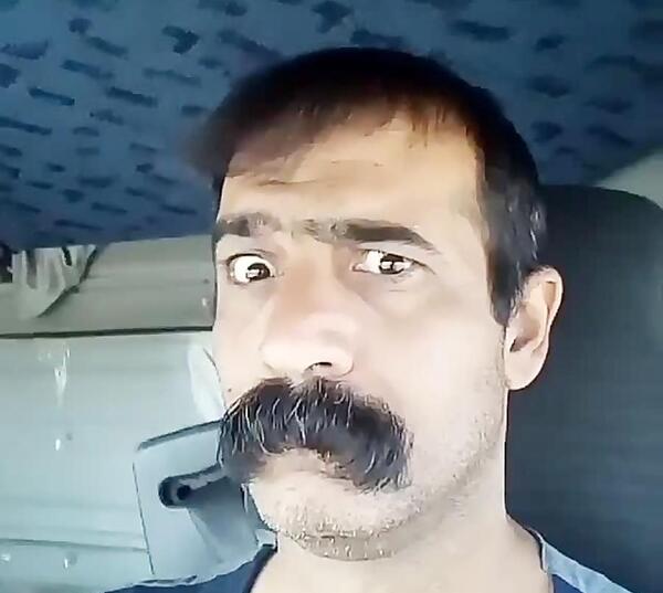 عکس خنده دار مرد سیبیلو