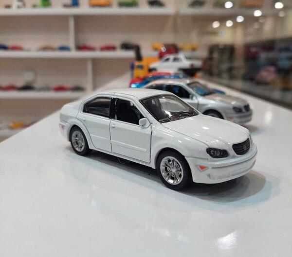 عکس ماشین ماکسیما سفید