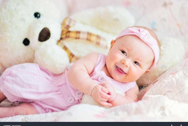 عکس نوزاد با خرس عروسکی