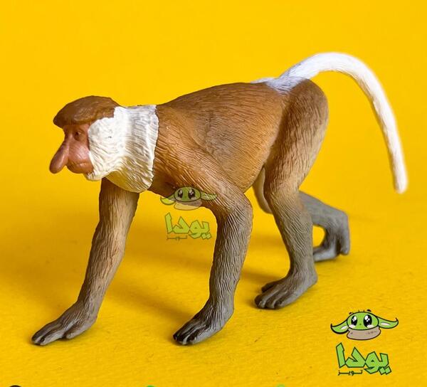 عکس میمون نشسته رو صندلی