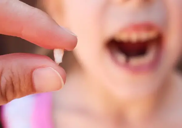 عکس لبخند بچه بی دندون