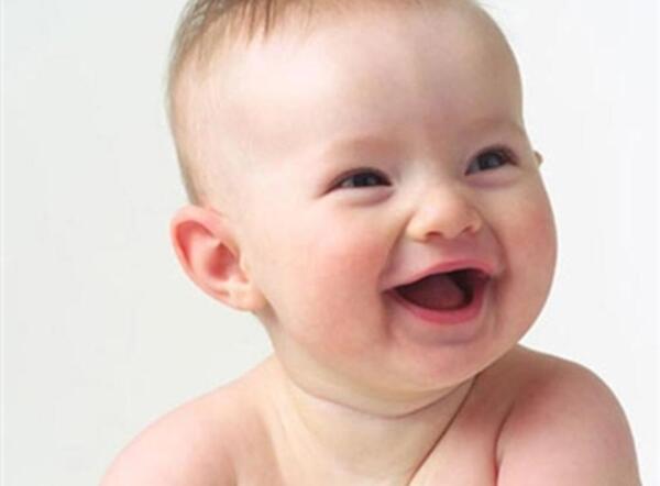 عکس لبخند بچه بی دندون