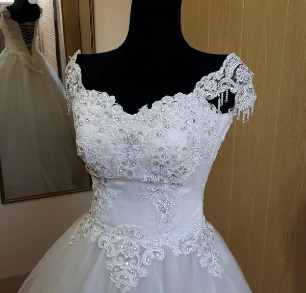 عکس از لباس عروس دکلته