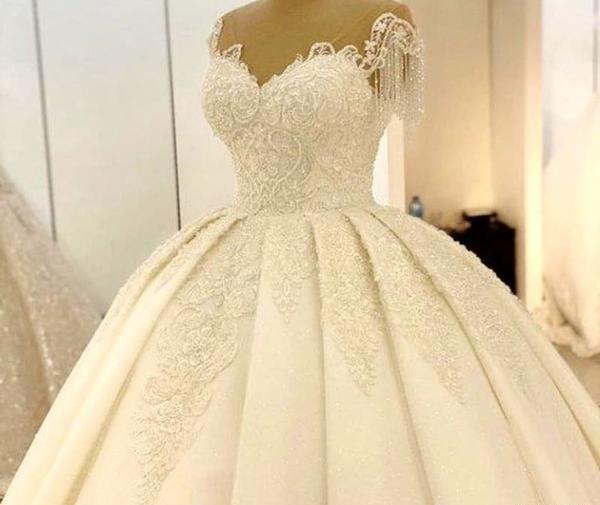 عکس از لباس عروس دکلته
