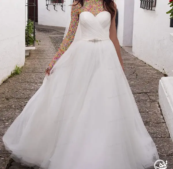 عکس از لباس عروس دکلته
