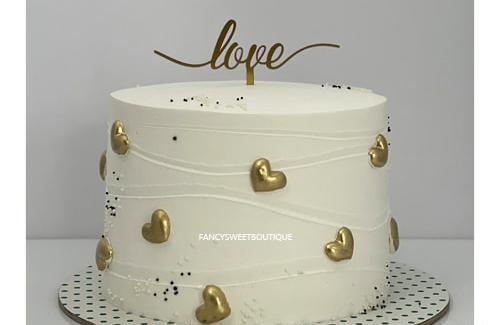 عکس کیک طلایی سفید